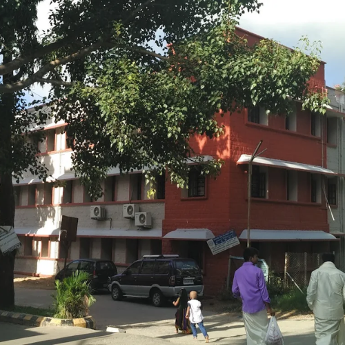 Karnataka Pravasi Soudha Rooms near Tirumala Museum